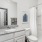 a bathroom with a marble countertop