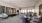 a large room with a table and chairs