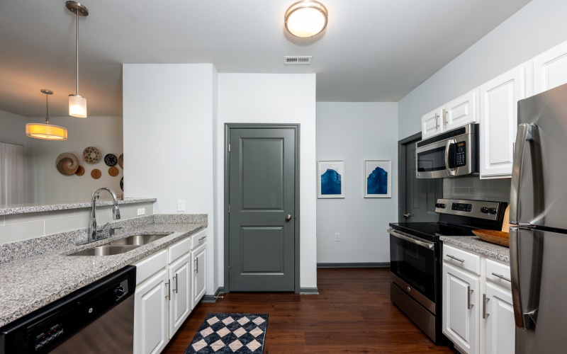 Modern kitchen with white cabinets