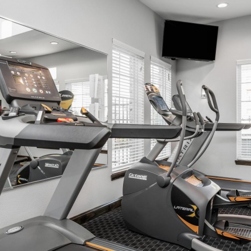 a gym with treadmills
