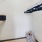 a closet with a shelves and a basket with objects on it